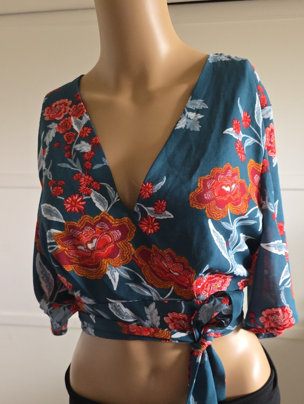Charlotte Russe Teal Wrap Top with Red and Orange Floral Embroidery